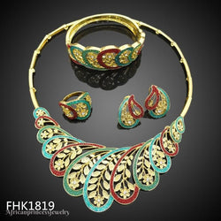 FOUR PIECE AFRICAN GOLD PLATED NECKLACE SET