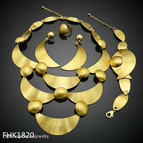 FOUR PIECE GOLD PLATED NECKLACE SET