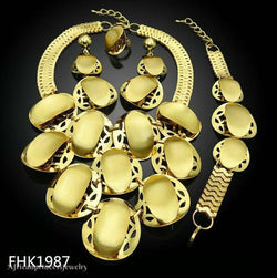 FOUR PIECE 18K GOLD PLATED AFRICAN NECKLACE SET