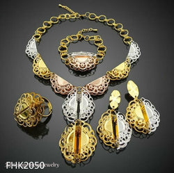 FOUR PIECE GOLD PLATED NECKLACE SET