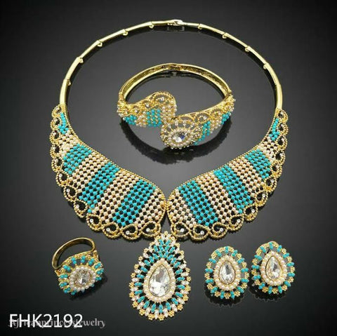 FOUR PIECE AFRICAN GOLD PLATED NECKLACE SET