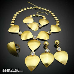 FOUR PIECE AFRICAN GOLD PLATED NECKLACE SET