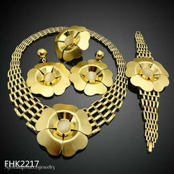 FOUR PIECE AFRICAN GOLD PLATED NECKLACE SET