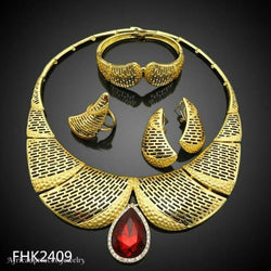 FOUR PIECE AFRICAN GOLD PLATED NECKLACE SET