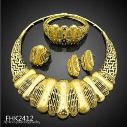 FOUR PIECE AFRICAN GOLD PLATED NECKLACE SET