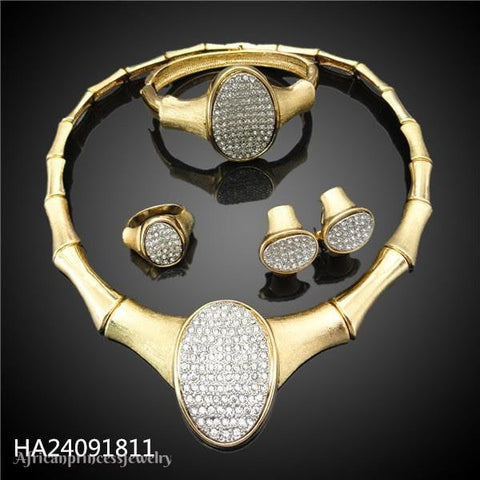 FOUR PIECE AFRICAN GOLD PLATED NECKLACE SET