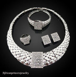 FOUR PIECE 18K WHITE GOLD SILVER PLATED JEWELRY SET