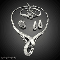 FOUR  PIECE 18K WHITE GOLD PLATED SILVER NECKLACE SET
