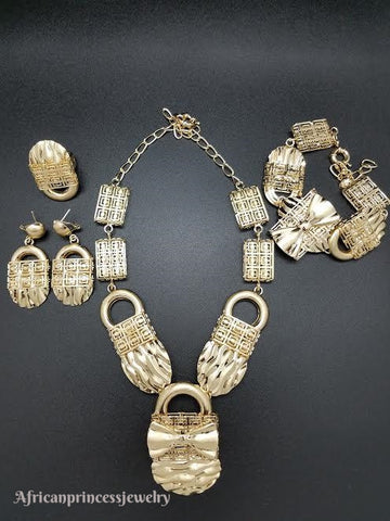 FOUR PIECE 18K GOLD PLATED NECKLACE SET