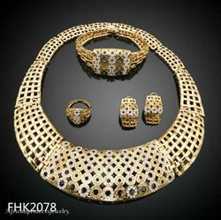 FOUR PIECE AFRICAN GOLD PLATED NECKLACE SET